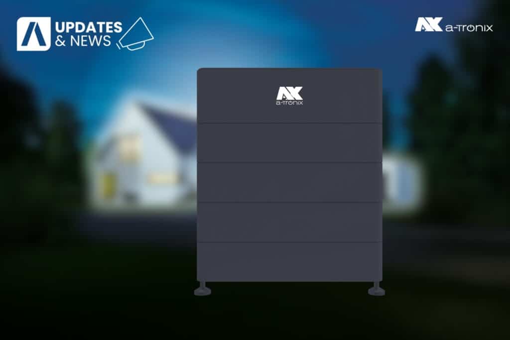 a-TroniX energy storage system against the blurred background of a modern house at night. Top left the logo "Updates & News", top right the a-TroniX logo.
